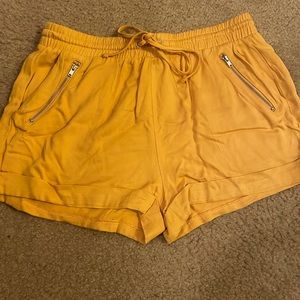 Forever 21 Yellow drawstring shorts. Not functional pockets.